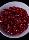 Pomegranate seeds close-up in a bowl