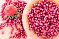 Pomegranate seeds with a strawberry