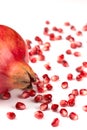 Pomegranate seeds on white background Punica granatum