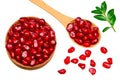 pomegranate seeds in wooden spoon isolated on white background. top view. pomegranate berries Royalty Free Stock Photo