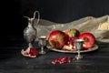 Pomegranate and stemware with liqueur Royalty Free Stock Photo