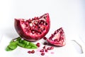 Pomegranate on the white cutting board