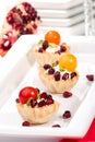 Pomegranates and cream cheese canapes Royalty Free Stock Photo