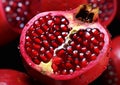 Pomegranates half with ripe red sweet seeds.Macro.AI generative