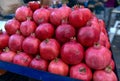 Pomegranates at the market in Athens. Healthy food and diet concept. Vegan nutrition. Royalty Free Stock Photo