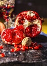 The pomegranates seeds and peaces of the pomegranates, nut with w