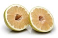 Pomelo fruit halved on white background Royalty Free Stock Photo