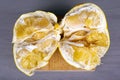 Pomelo fruit top view, halves of exotic fruit on gray background. grapefruit hybrid