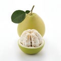 Pomelo Fruit Whole fruit and half peeled pulp resting inside its own bright green rind Royalty Free Stock Photo