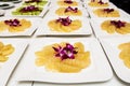 Pomelo slices on dish in pyramid shape