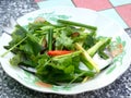 Pomfret Fish dish cooking with various ingredients. Fresh raw fish decorated with vegaetable. Steaming Fish Chinese Style Royalty Free Stock Photo