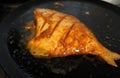 Pomfret fish getting shallow fried