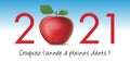 Greeting card 2021 with the concept of red apple symbol of temptation where of well-being.