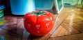 Pomodoro timer on the talble - mechanical tomato shaped kitchen timer for cooking or studying