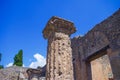 Pompeii, archeological site, ancient ruins of villa with column. Royalty Free Stock Photo