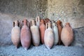 Pompeii, Italy, June 26, 2020 amphorae in an ancient warehouse Royalty Free Stock Photo