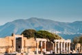 Pompeii, Italy. People Walking Near Remains Of Ancient Buildings On Territory Pompeii Forum