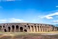 Pompeii in Italy, ruins of the antique Temple of Apollo with bronze Apollo statue, Naples Royalty Free Stock Photo