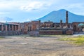 Pompeii in Italy, ruins of the antique Temple of Apollo with bronze Apollo statue, Naples