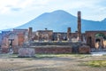 Pompeii in Italy, ruins of the antique Temple of Apollo with bronze Apollo statue, Naples Royalty Free Stock Photo