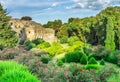 Pompeii in Italy, ruins of the antique Temple of Apollo with bronze Apollo statue, Naples Royalty Free Stock Photo