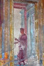 Pompeii, Italy - 09 24 2018: A Well Preserved Fresco Among the Ruin