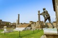 Pompeii ruins: Temple of Apollo with bronze Apollo statue Royalty Free Stock Photo