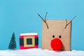 Pompom reindeer and santa belt gift boxes