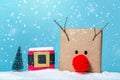 Pompom reindeer and santa belt gift boxes