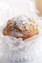 Pompous almond muffin and coffee on background