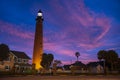 The Ponce de Leon Inlet Light glowing during sunrise