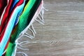 Poncho serape background Mexican cinco de mayo fiesta wooden copy space