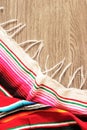 Poncho serape background Mexican cinco de mayo fiesta wooden copy space Royalty Free Stock Photo