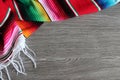 Poncho serape background Mexican cinco de mayo fiesta wooden copy space Royalty Free Stock Photo