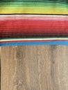 Poncho serape Mexican background for Mexico cinco de mayo fiesta wooden copy space stripe pattern minimalist simple Mexican backgr Royalty Free Stock Photo