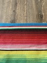 Poncho serape Mexican background for Mexico cinco de mayo fiesta wooden copy space stripe pattern minimalist simple Mexican backgr Royalty Free Stock Photo