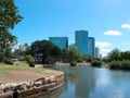 Pond in Ala Moana Beach Park with Condominiums towers across the