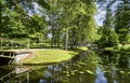 pond with bridge in Schwerin Castle park in fall