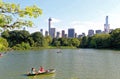 Pond in the central park in NYC. Central Park and Manhattan Skyline. Midtown Manhattan skyline viewed from Central Park