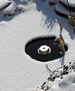 Pond with an electric heater melting the ice in winter Royalty Free Stock Photo