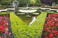 Pond, flower bed and fountain. Royalty Free Stock Photo