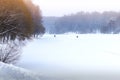 Pond and forest under snow. Winter fishing Royalty Free Stock Photo