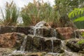 Pond with a fountain in Gan Guru kangaroo park in Kibutz Nir David in the north of Israel