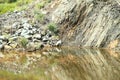 Pond by Geoheritage Site of Ultramafic Rocks