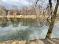 Pond in Lefortovo Park in spring in cloudy weather. Moscow