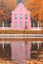 Pond and an old Dutch house in the autumn landscape in Moscow, Kuskovo, Russian Federation Royalty Free Stock Photo