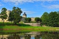 The pond and palace in Gatchina garden. Royalty Free Stock Photo