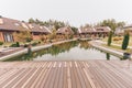 Pond and countryside houses Royalty Free Stock Photo