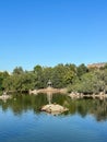 Pond with a small island in the middle and a gazebo on the island Royalty Free Stock Photo