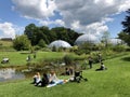 Pond or Teich and Tropenhaus - Botanical Garden of the University of Zurich or Botanischer Garten der Universitaet Zuerich Royalty Free Stock Photo